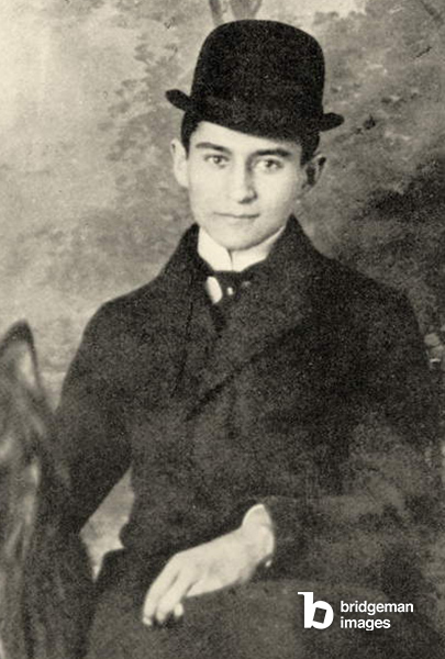 Poträt von Franz Kafka mit seinem Hund
