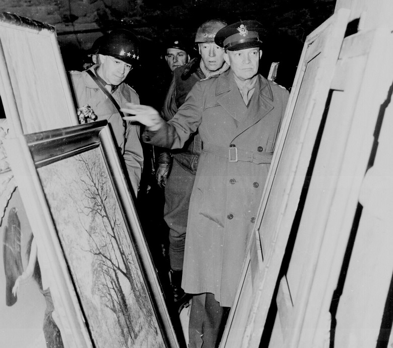 General Dwight Eisenhower viewing confiscated art recovered from the Nazi's after the end of World War II, 1945.